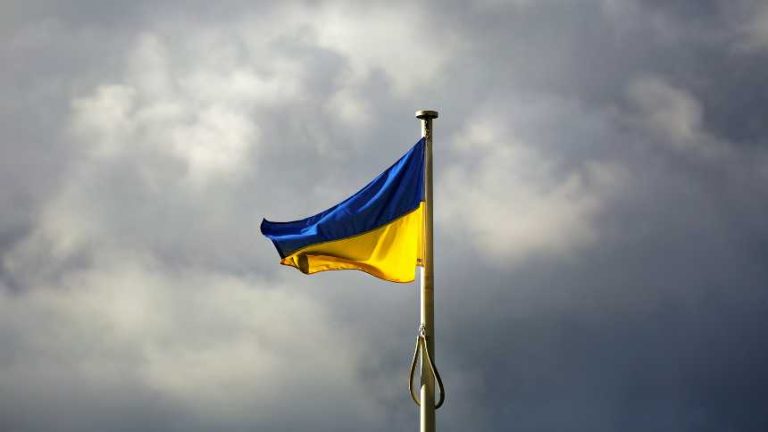 Doctoral student working on dissertation while also helping young people in her native Ukraine