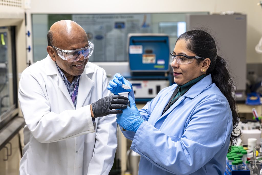 Parans Paranthaman and Jayanthi Kumar perform direct lithium extraction from brine samples in a laboratory in Building 4100 at Oak Ridge National Laboratory.